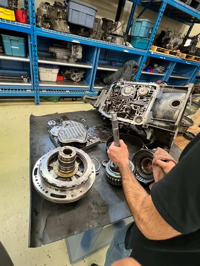 Transmission components being worked on at a bench
